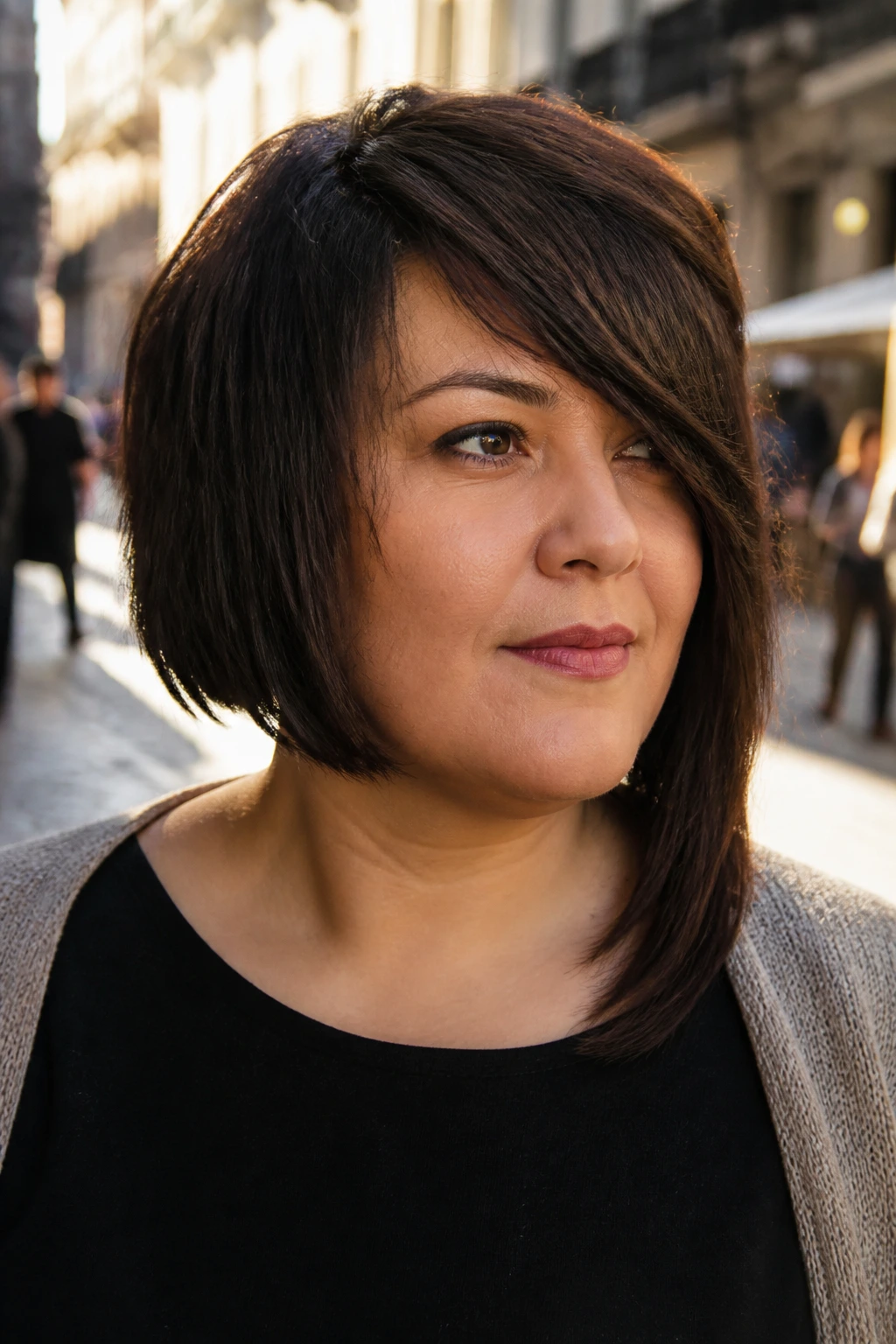 Portrait of a woman with an asymmetrical bob and side-swept bangs