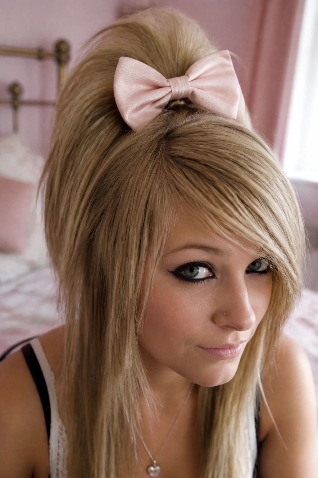 Portrait of a real woman wearing a large bow in a half-up hairstyle