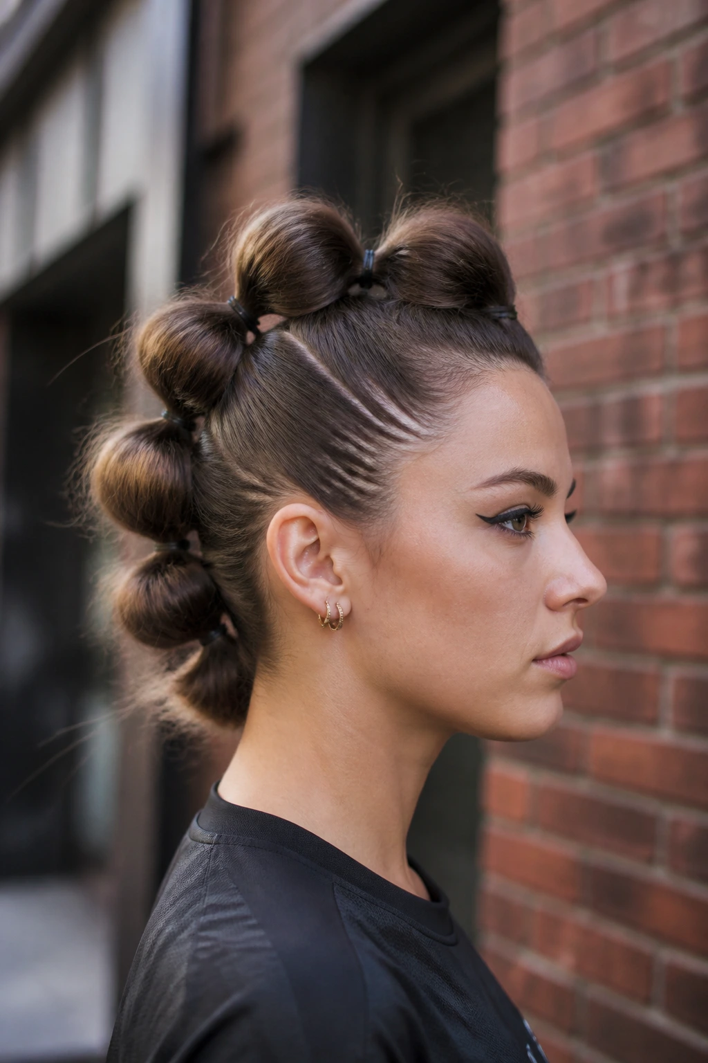 Close-up of a real person with a high-tension bubble mohawk
