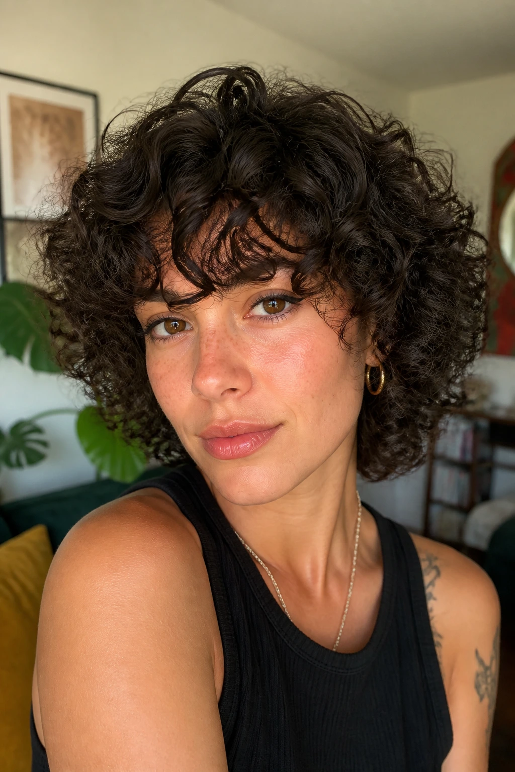 Real person with curly shag and long fringe under natural light