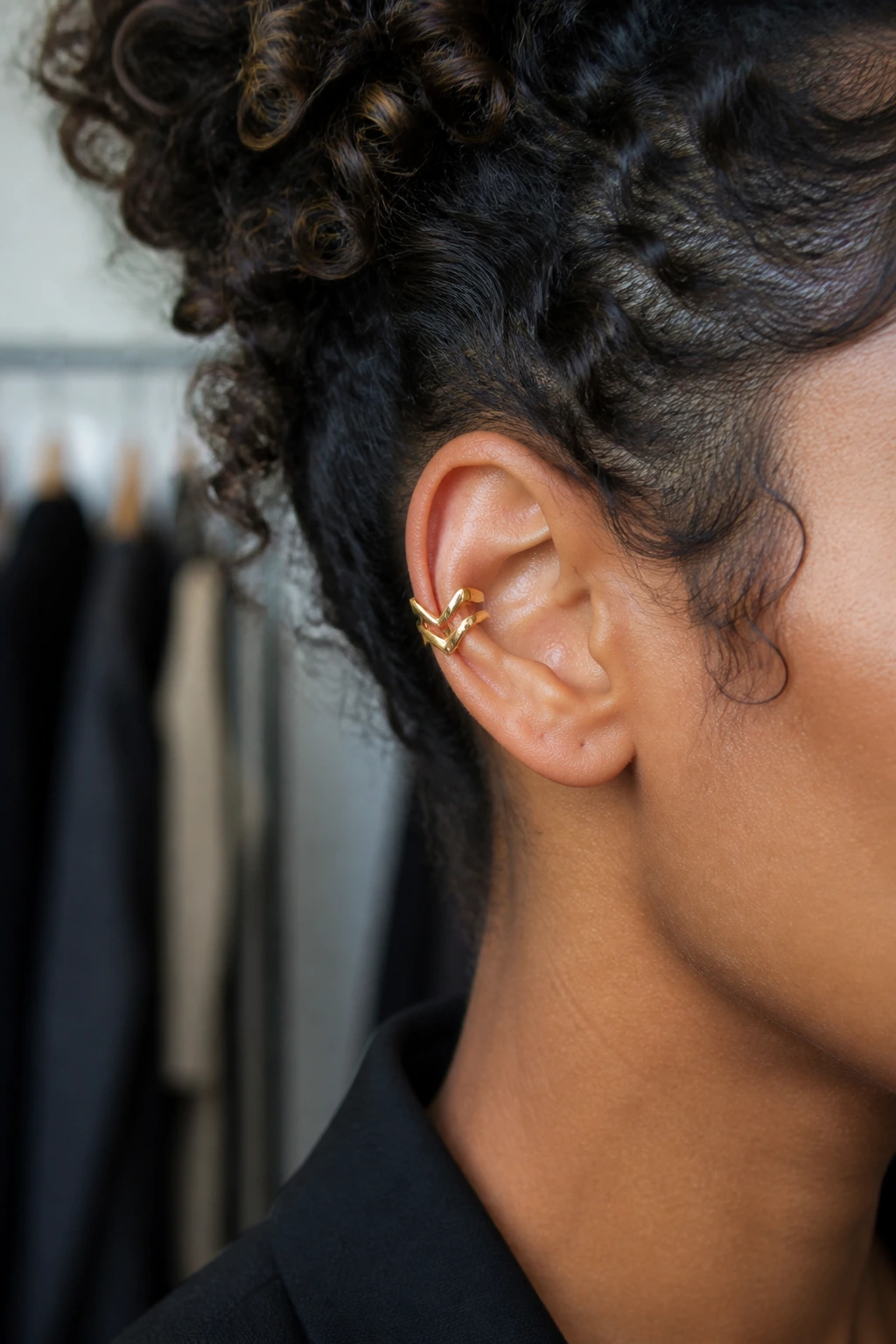 Close-up of chevron-shaped ear cuff on real person