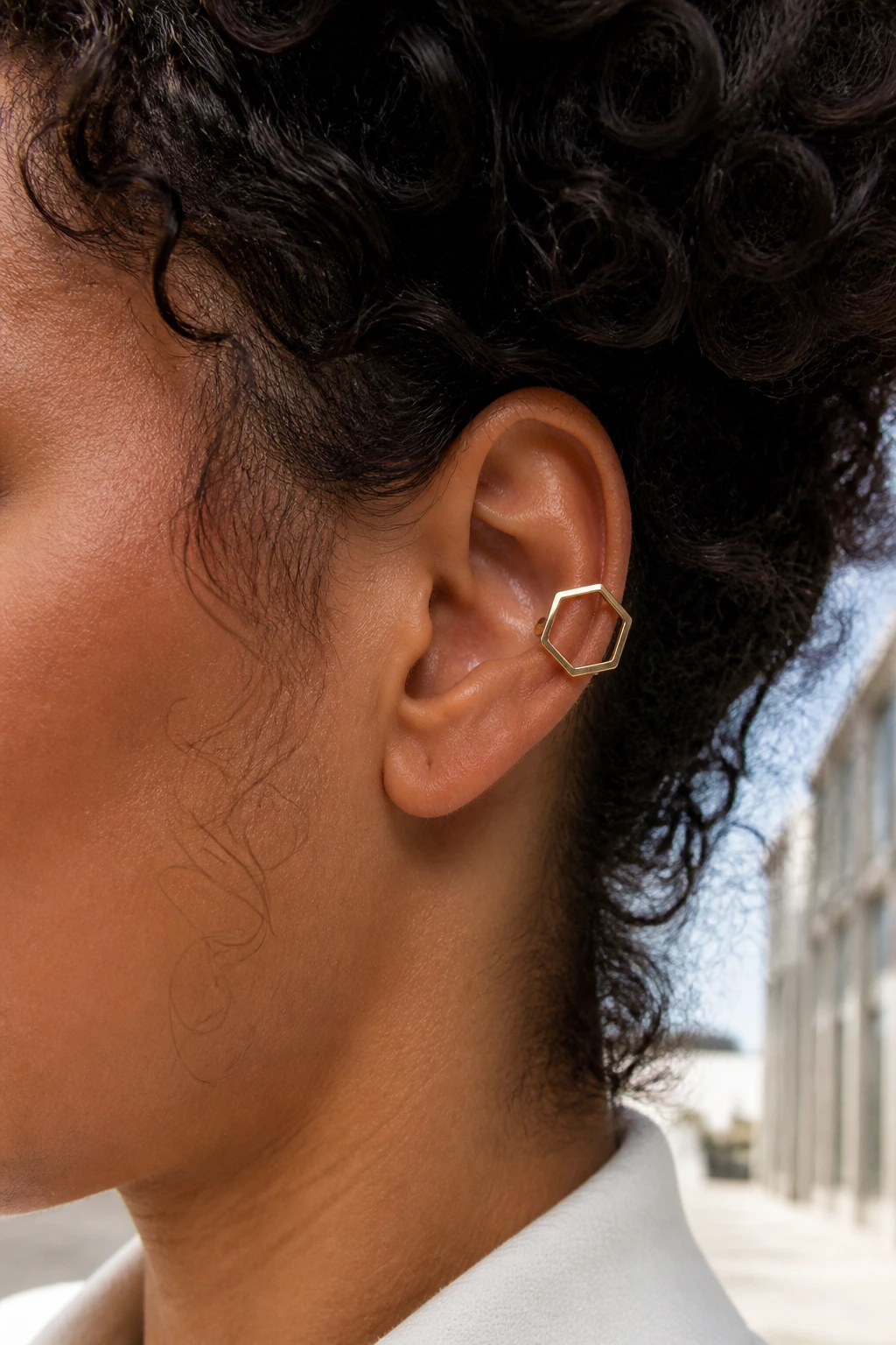 Close-up of hexagon cuff on real person's ear