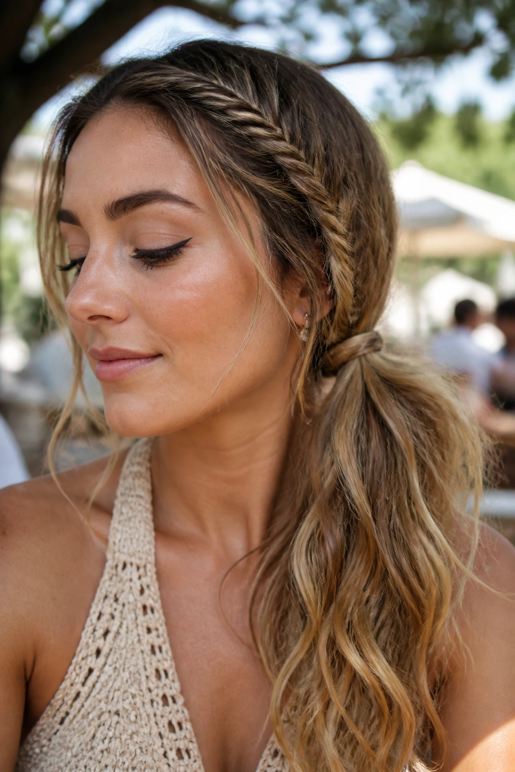 Fishtail braid into loose side ponytail on real person