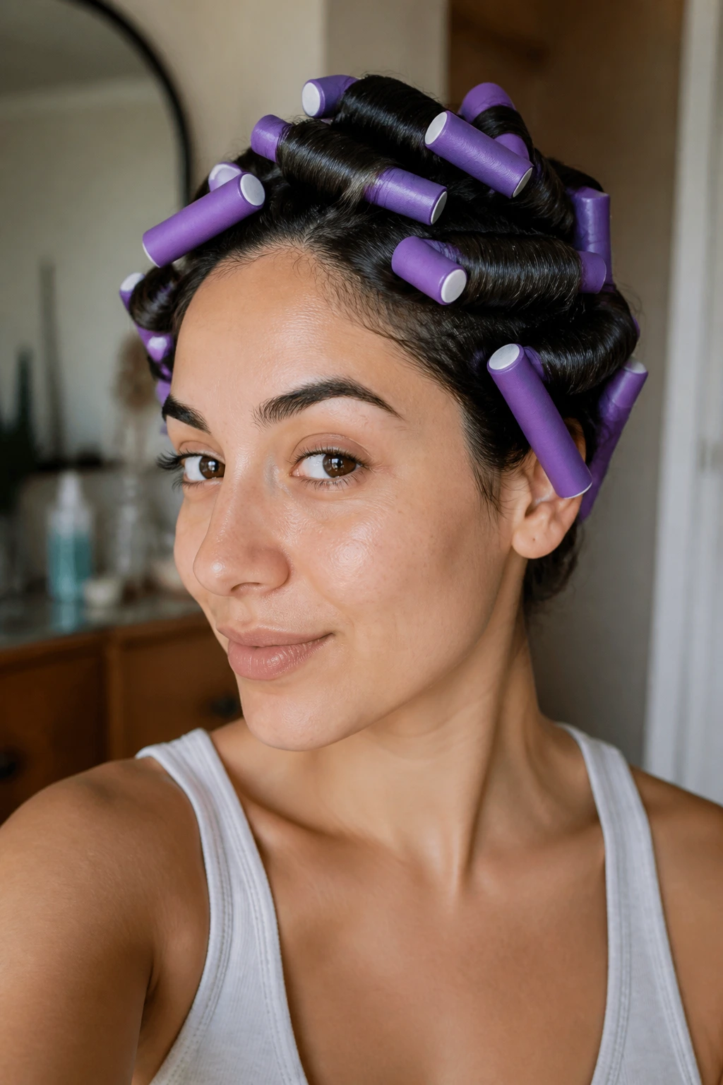 Real Latina woman with hair wrapped around Flexi-Rods ready for pin curling
