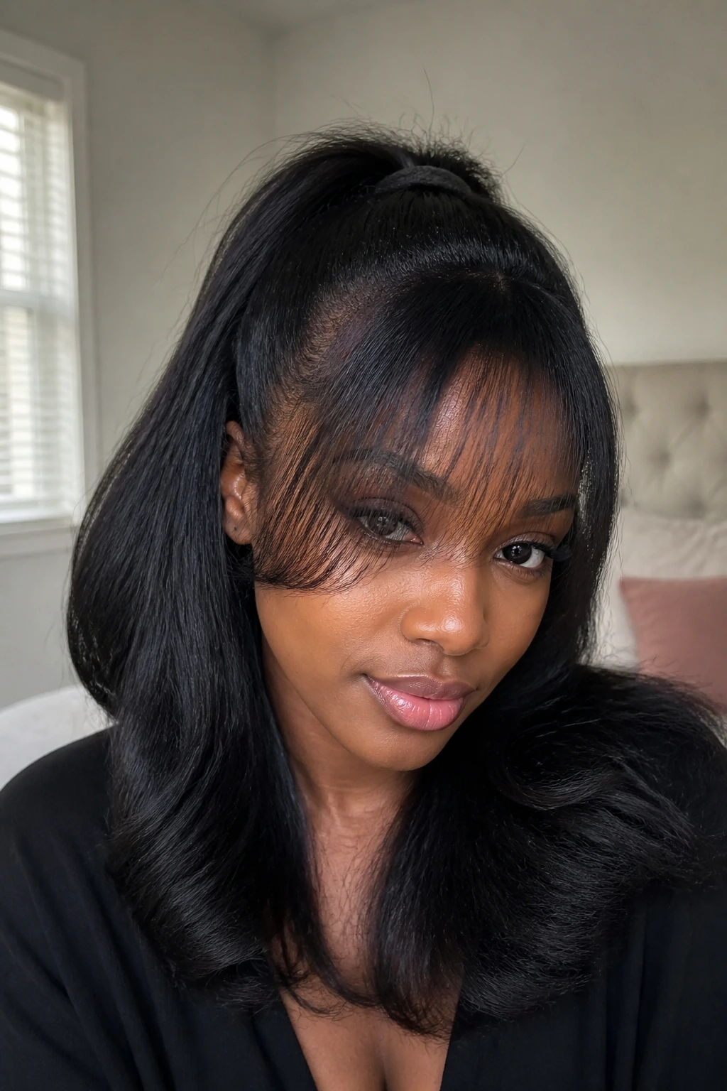 Woman with half-up half-down blowout and wispy fringe