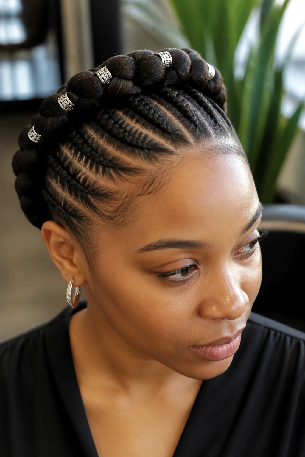 Close-up of Halo Braids with Silver Cuffs on a real person