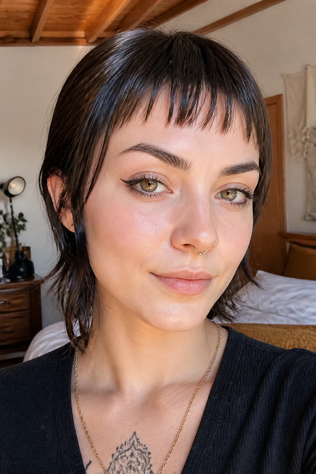 Close-up portrait of a woman with piece-y sliced baby bangs in natural window light