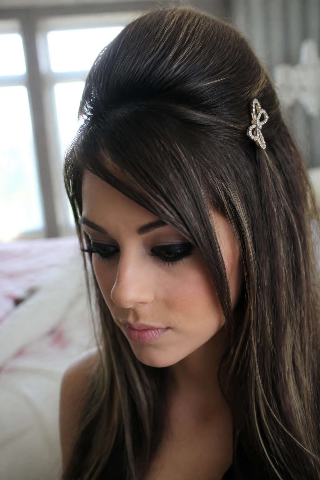Close-up of a real woman with a voluminous Pouf Crown hairstyle