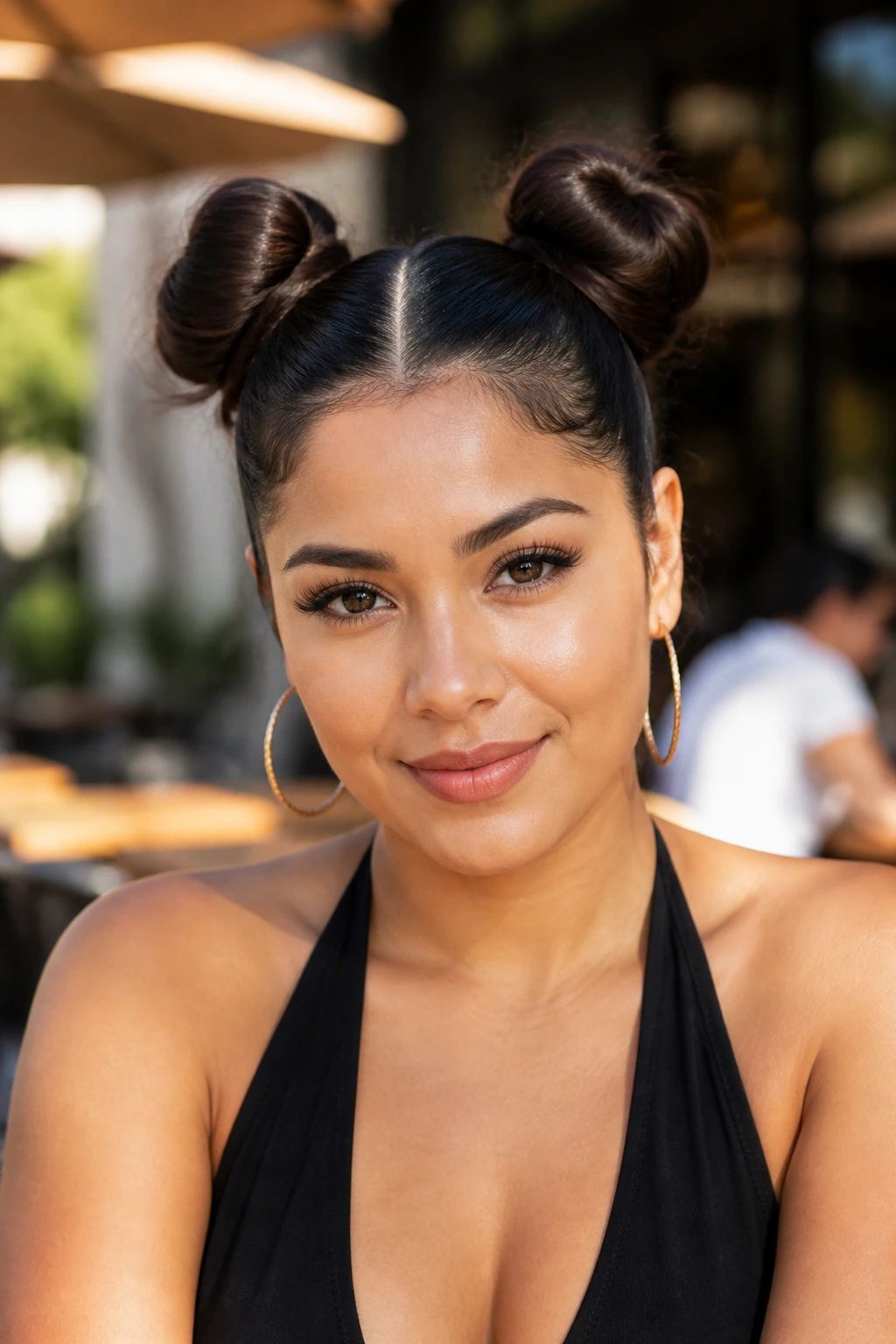 Portrait of a person with two high space buns outdoors
