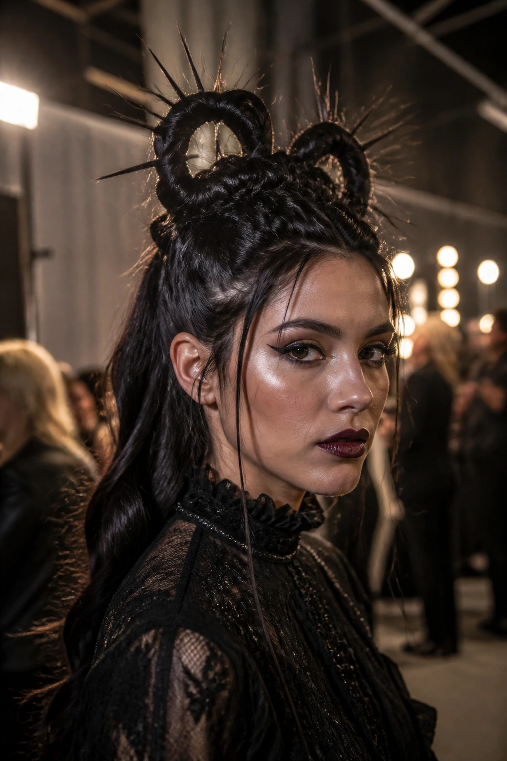 Close-up of a real person with two tall half-up loops in a spiked Victorian style