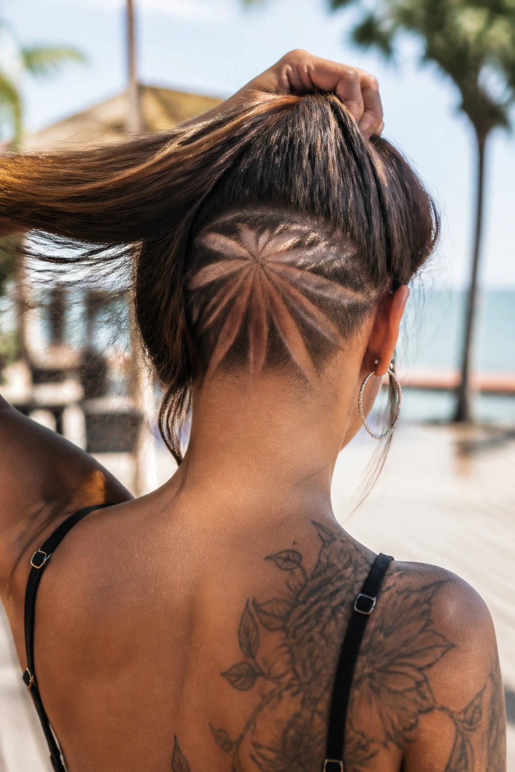 Back-of-head with starburst shaved pattern at the nape