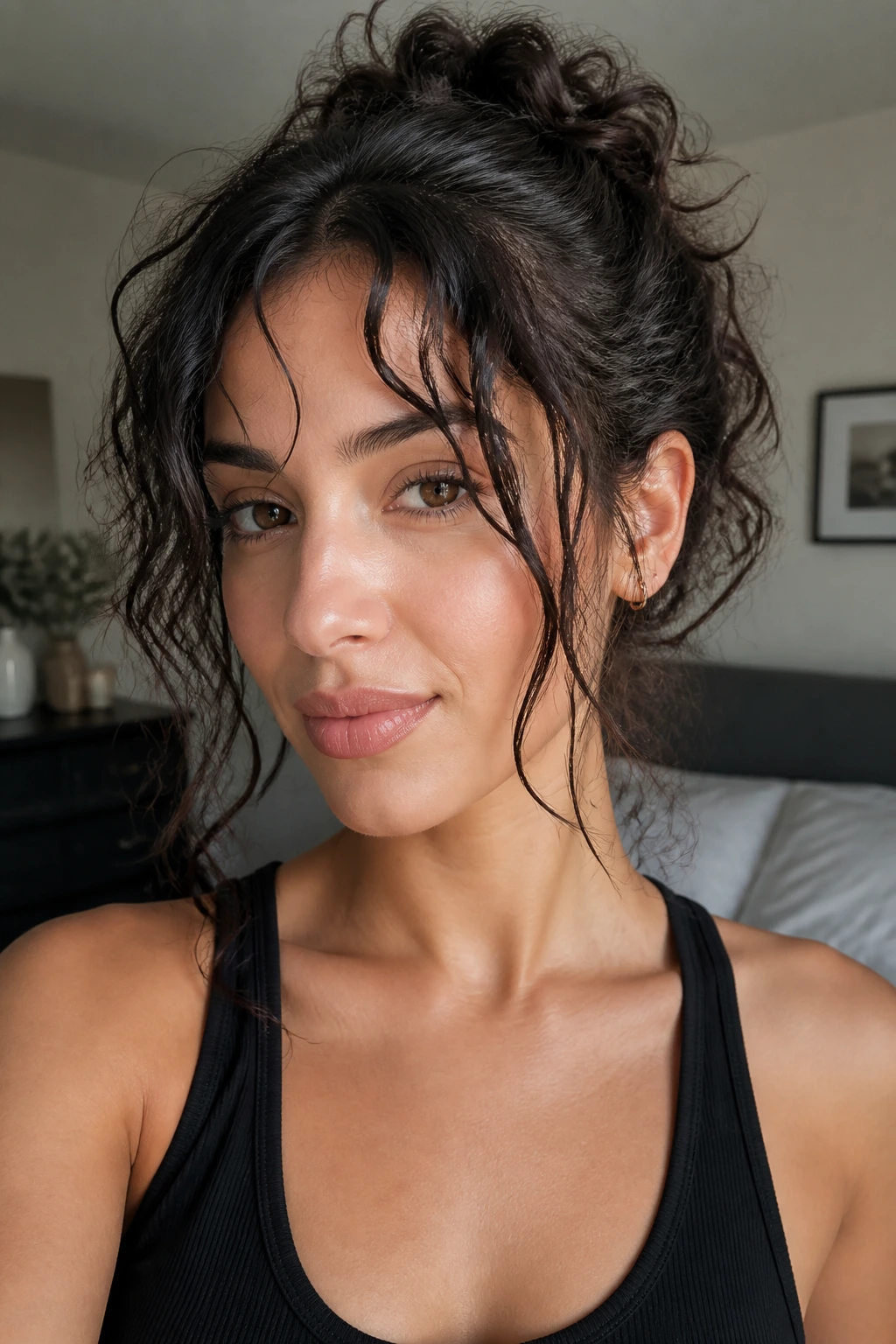 Close-up of tapered tendril bangs and face-framing layers on a real woman