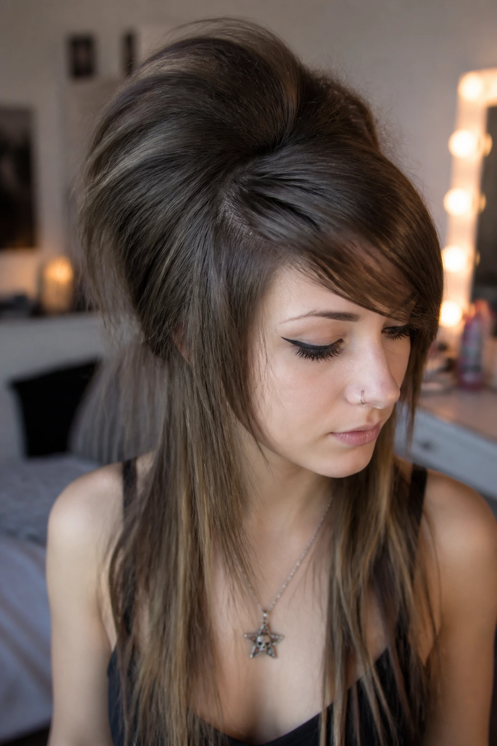 Portrait of a real woman with a teased crown and smooth top layer.