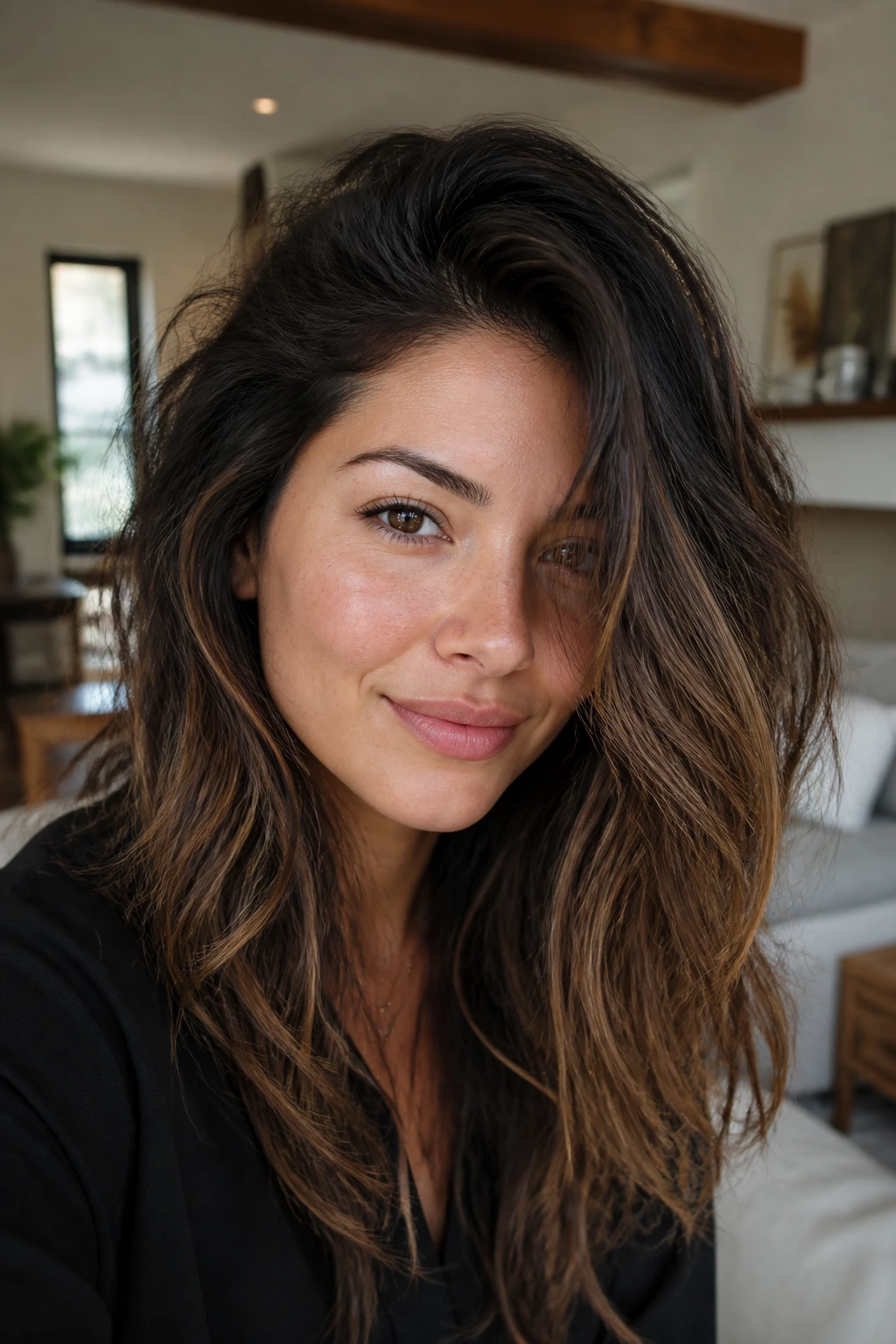 Close-up portrait of a real woman with a textured messy side-part