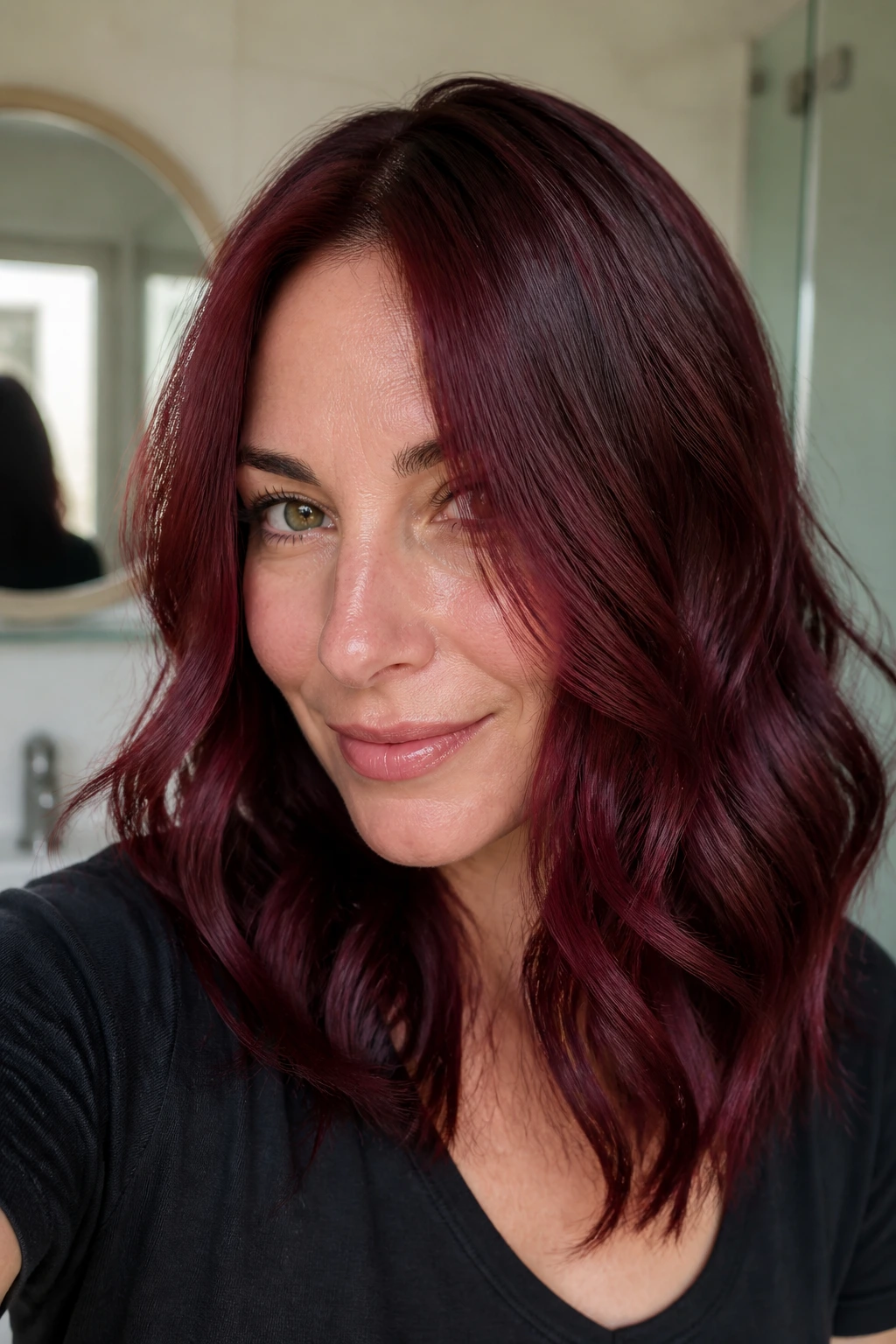 Two-week post-color check-in portrait of wine hair