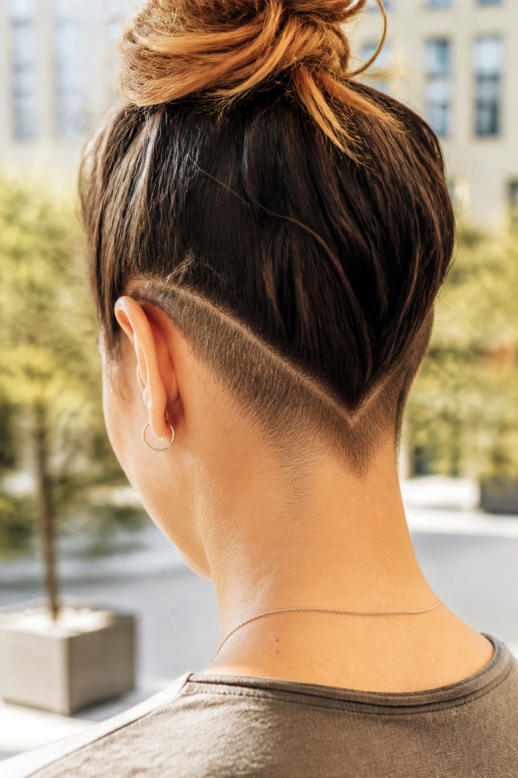 Back-of-head close-up showing a sharp V-shaped nape hairline