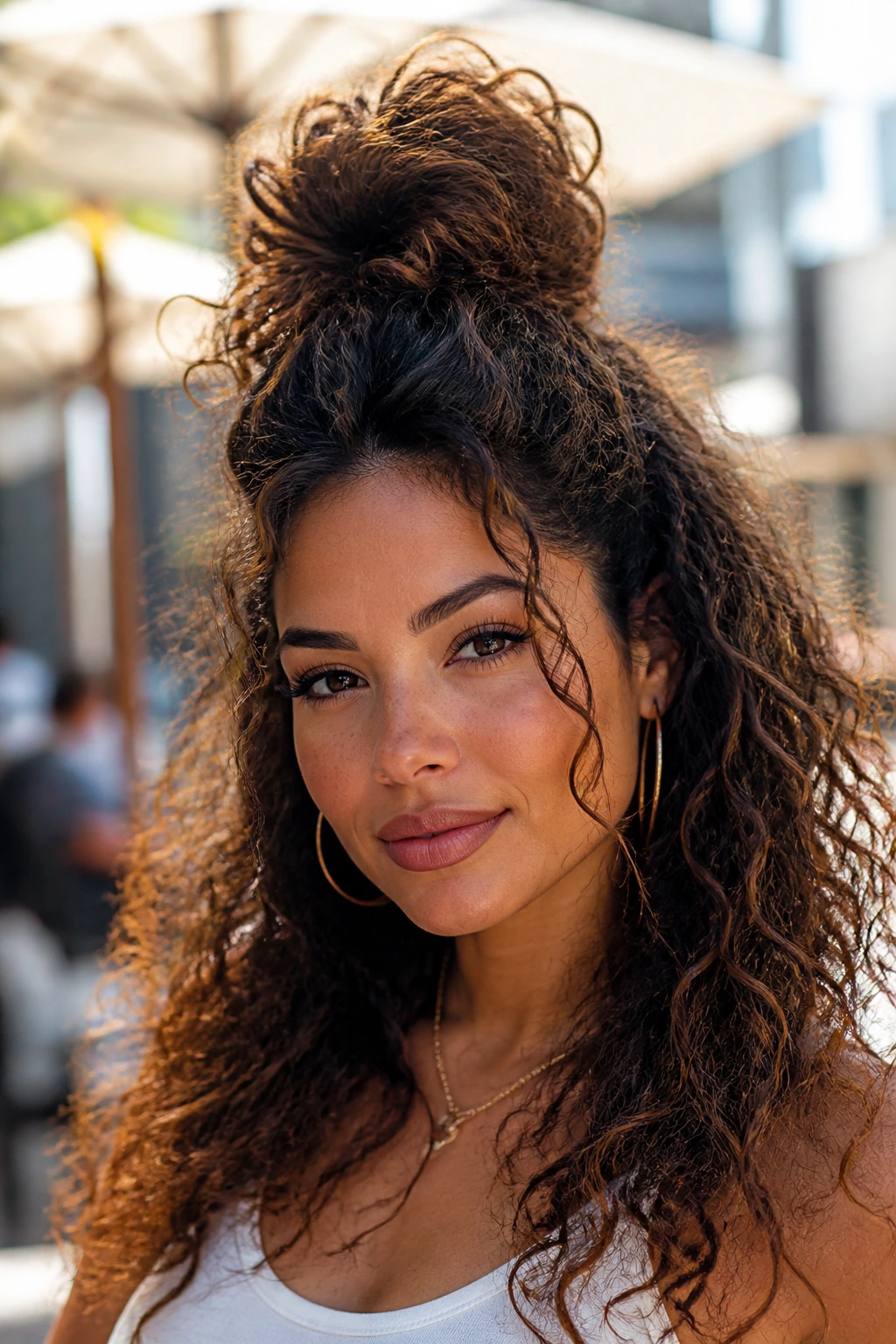 Real woman with half-up pineapple hairstyle
