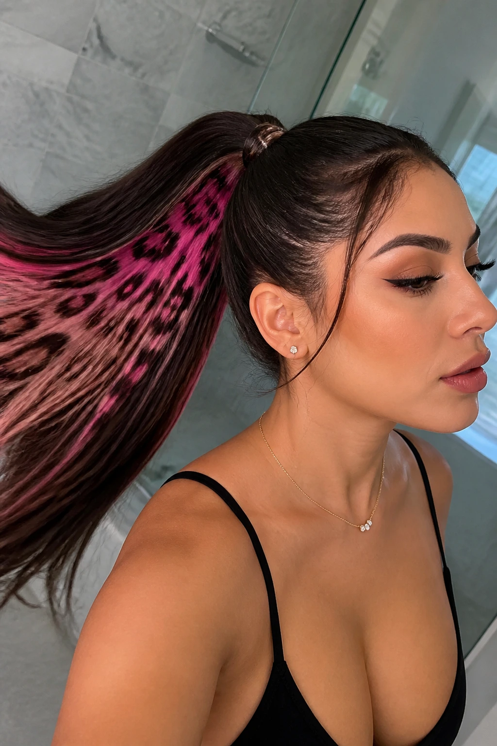 Close-up of a real woman with leopard print under the high ponytail