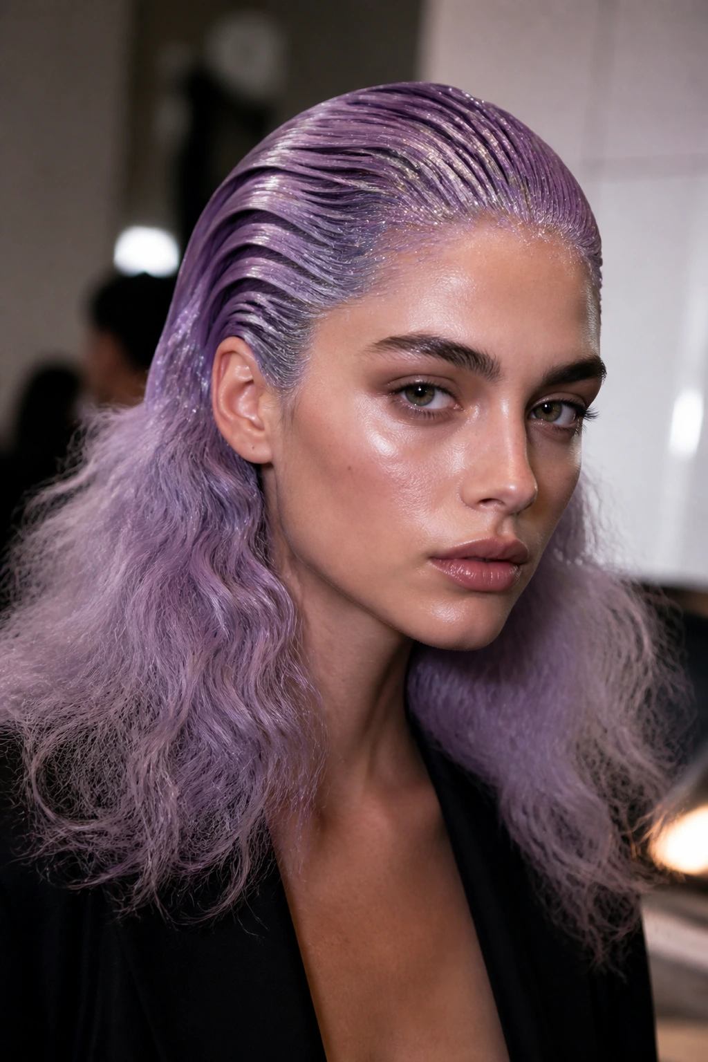 Close-up of a real woman with lilac space-age slicked back waves