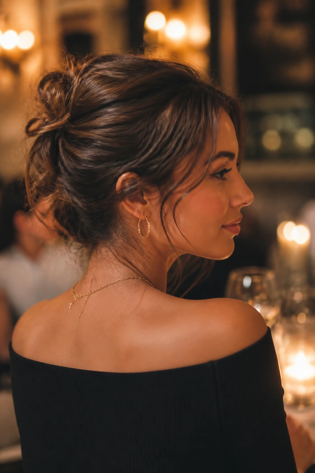 Close-up of a real woman with a messy French twist