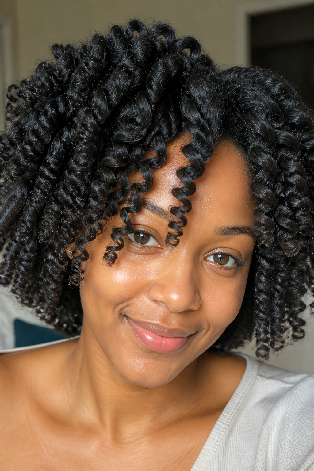 Close-up of a person with twist-out curls after conditioning